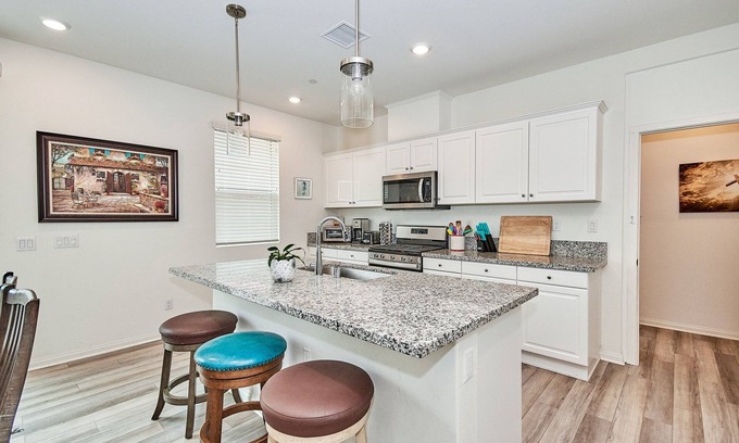 Upland Condo | Modern Retreat: Exceptional Stay Near Mall with Spa & Pool
