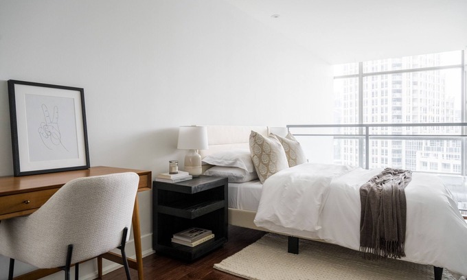 Bathurst Quay Apartment | Relax at Loft Riviera: Pool, Spa & Lake View Amenities