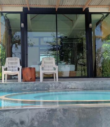 Ko Mook Resort | Beachfront Bliss at Mook Tamarind Resort: Family Fun Awaits