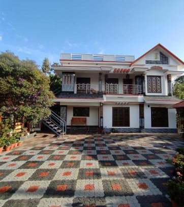 Udumbanchola House | Family-Friendly Moon Homestay with 9.5/10 Guest Rating
