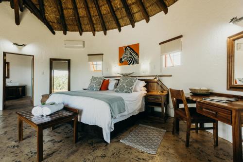Weipe Cabin | Inviting Mopane Bush Lodge: 4-Star Stay with Ocean Views