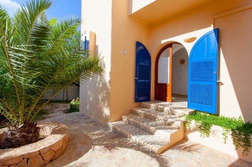 Es Pujols House | Oceanfront Apartments in Spain with Pool & Family Amenities