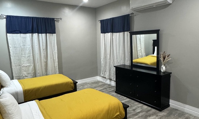 Nassau Apartment | Modern Townhouse with Hot Tub, Pool & Free Parking