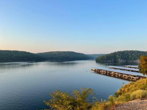 Kaiser Apartment | Experience Breathtaking Lake Views with Pool & Beach Access