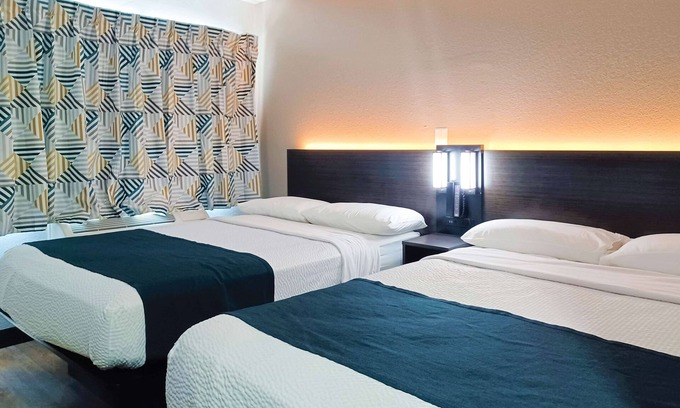 Raisin Hotel | Budget-Friendly Motel 6 Fresno, CA - Family Pool & Breakfast