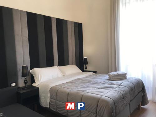 Motta Sant'Anastasia House | Discover Motta Palace Apartments & Rooms - 9/10 Rated Stay