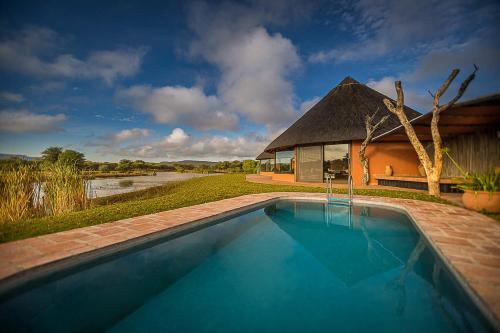 Omaruru Cabin | Explore Mount Etjo Safari Lodge with Inviting Amenities