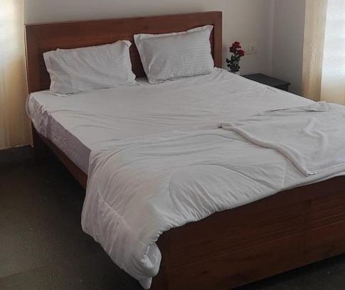 Kunnathidavaka House | Scenic Mountain View: Family-Friendly Getaway Awaits