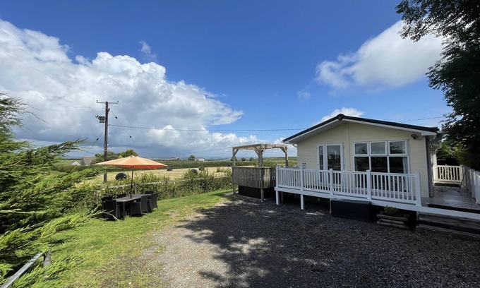Whitland Cottage | Mountain View Lodge: Pet-Friendly Retreat with Hot Tub
