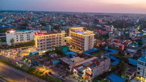 Siddharthanagar Hotel | Explore Mourya Hotel: Family-Friendly with Pool & Spa