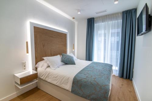 Valdepenas Apartment | Family-Centric Stay at MQ Suites Veronica - 9.6/10 Rated