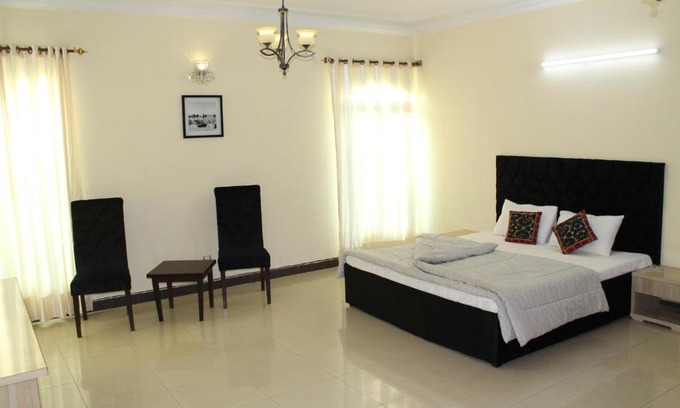 E-11 Sector House | Inviting Mudan Regency Guest House with Family-Friendly Perks