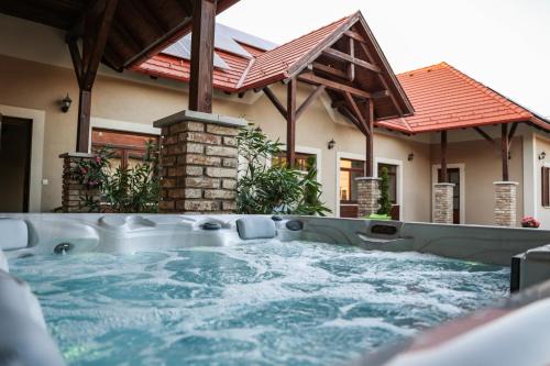 Many Apartment | Top-Rated Muflon Apartman with Hot Tub in Mány