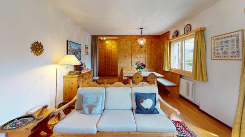 Celerina-Schlarigna Apartment | Discover Mulin: 4-Star Family-Friendly Retreat Awaits