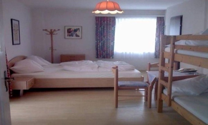 Seeboden House | Multi-Bed Room with Balcony - Strandhotel Pichler Awaits