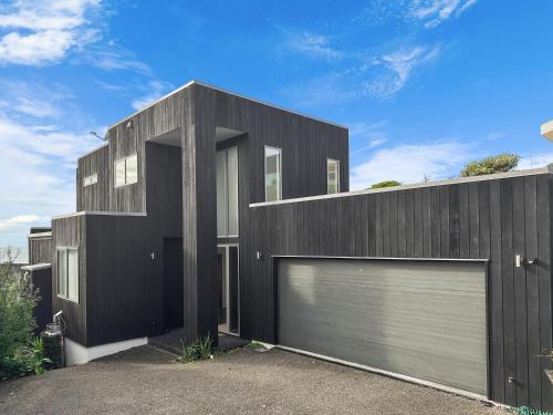 Murrays Bay Villa | Ocean View Modern Oasis with Child-Friendly Amenities
