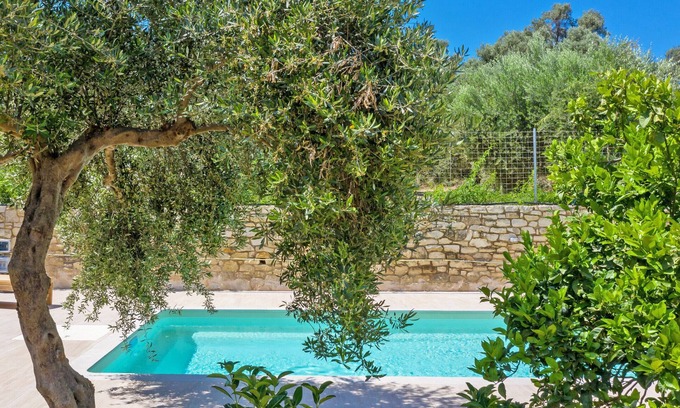 Houdetsi Villa | Indulge at Muse Villa Pigi with Heated Pool & Prime Amenities