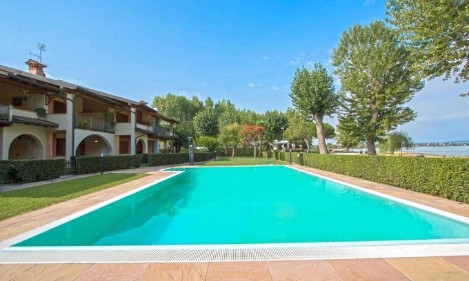 San Benedetto di Lugana Apartment | Experience My Sirmione Beach Apartment with Ocean Views