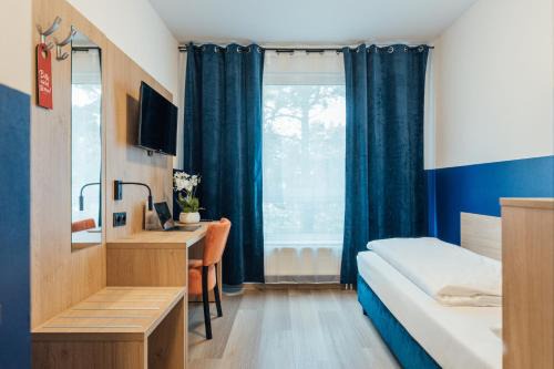 Heimfeld Hotel | Family-Friendly MYKY Hotel Boardinghouse for Memorable Stays