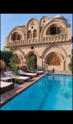 Luxor Apartment | Enchanting Habou Domes Villa with Ocean View & Pool
