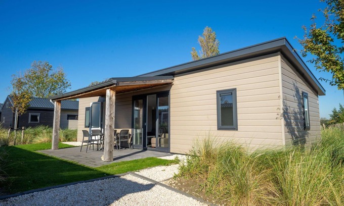 Municipality of Hellevoetsluis House | Cozy Chalet with 3 Bedrooms and Full Kitchen Amenities