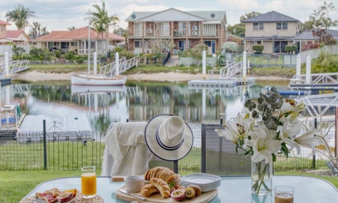 Yamba Villa | Elegant Nabilla Court: Canal Front Duplex with Pool & Views