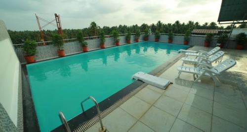 Guruvayur Hotel | Beautiful Nakshatra Emerald: Oceanfront with Pool Access