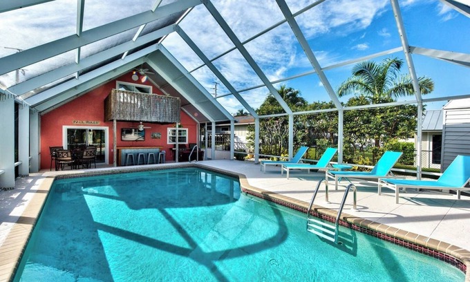 East Naples House | Beachfront 3-Bedroom House with Pool & Tiki Bar Oasis