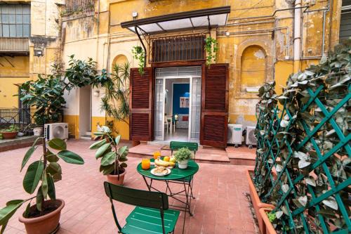 Montecalvario Apartment | Explore Napoli Centro Casa Vacanza with Oceanfront Views