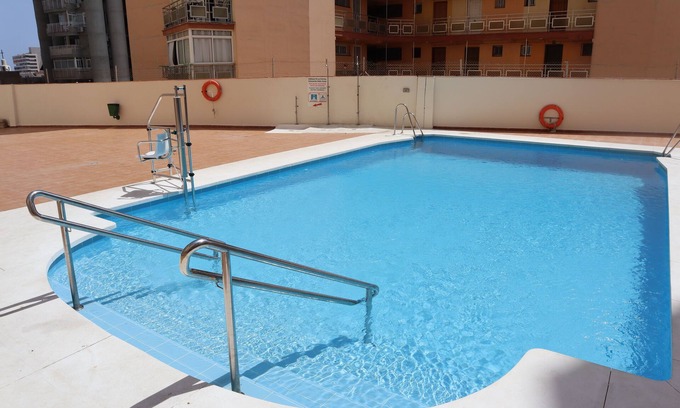 Torremolinos City Centre Apartment | Serene Nature Apartment with Ocean View & Pool Access