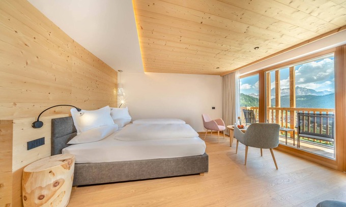 Colfosco Hotel | Elegant Nature Hotel Delta: Guest Rated 9.8 with Spa Amenities