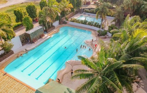 Talisay Resort | Idyllic Nature's Village Resort with Pool & Family-Friendly Fun