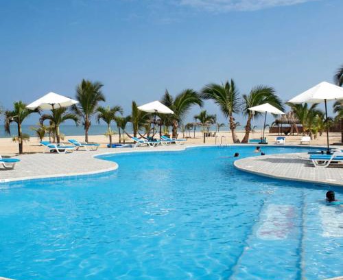 Caleta Cruz Hotel | Relax at Nauti-k Beach Hotel with Oceanfront Views