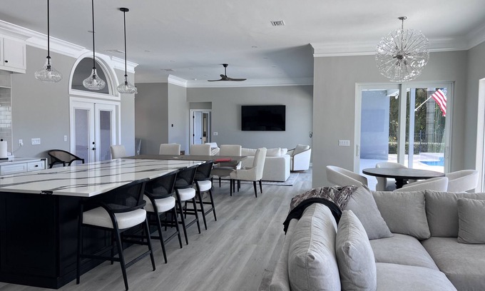 Palm River Estates House | Sunset Haven: Premier Retreat with Pool and Ocean Views in Naples