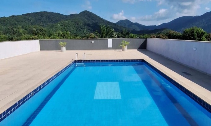 Downtown Ubatuba Apartment | Relax in Ubatuba: Pool, Ocean Views & Top-Rated Amenities