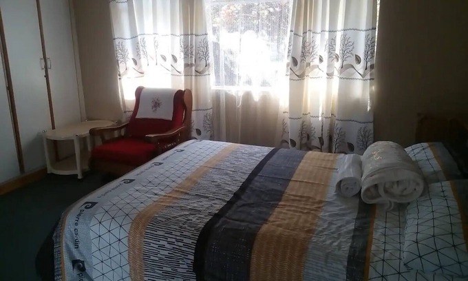 Harare Apartment | Cozy Guest Suite with Office Corner for Family Getaways