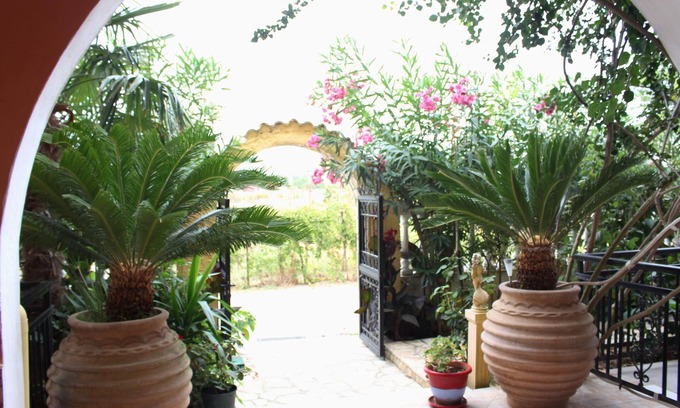 Ag. Georgios Apartment | Cozy Nefeli Apartment with Sea View & Garden Amenities
