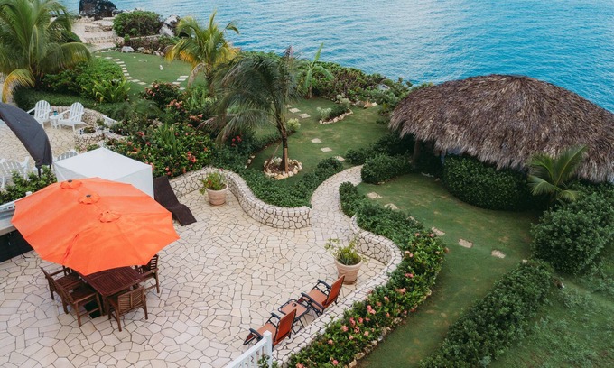 Orange Bay House | Seaside Bungalow Retreat with Private Snorkeling Access