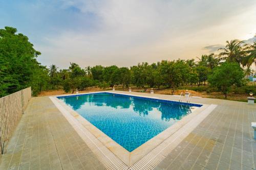 Kalapettai House | Neithal Farm Resort with Swimming Pool by Roscotel