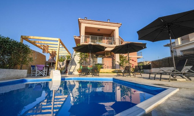 Kalpaki House | Inviting Nektarios & Eftychia Suites: 4-Star Oceanfront Stay