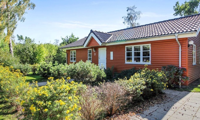 Grena Strand House | Beachside Escape: Nela with Ocean View & Spa Amenities