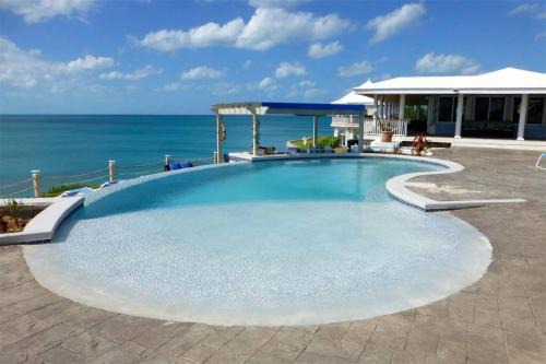 Rainbow Bay Apartment | Discover Neptune Cove: Family-Friendly Getaway with Pool
