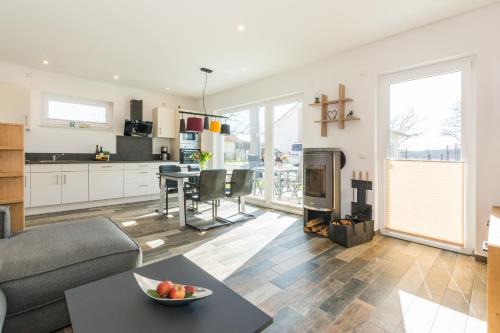 Krakow am See House | Explore Neu Ferienhaus: Sauna & Fireplace, 4-Star Comfort