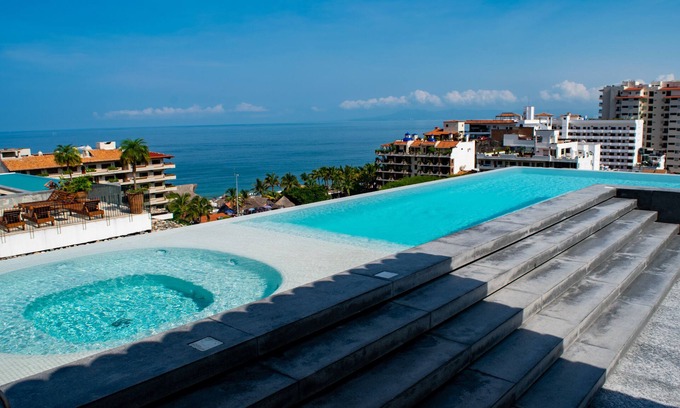 Emiliano Zapata Condo | Cozy 2 BR Condo with Rooftop Pool & Ocean Views