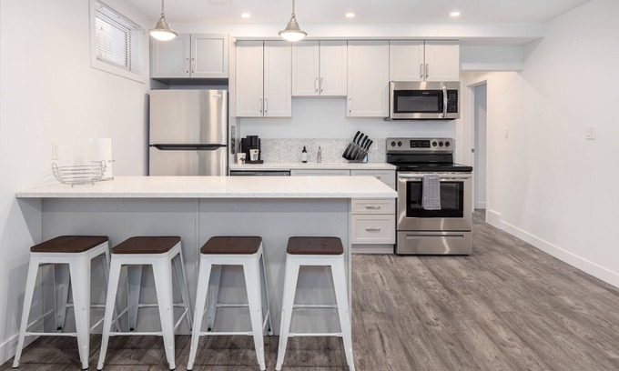 Saskatoon House | Modern 2-Bed Basement Suite with Indoor Fireplace & Breakfast