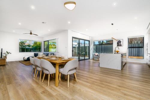 Ainslie House | Modern 4-Bedroom City Home with Tesla Charger Awaits You