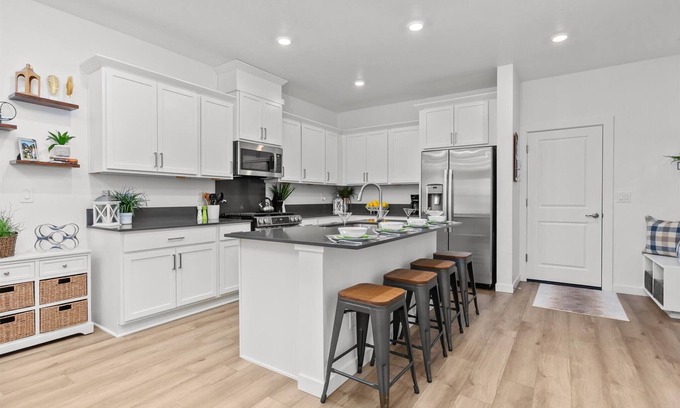 Eagle House | New 4-bedroom townhome w/Pool and 2 car garage in welcoming Eagle with AC, WiFi.