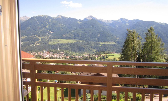 Daiano Apartment | Bright Attic Escape with Pool & Pet-Friendly Amenities