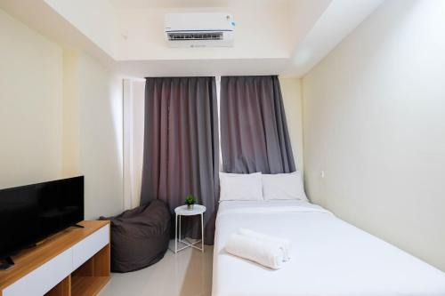 Pondokcina Apartment | Modern Studio at Evenciio Margonda Apartment Awaits You