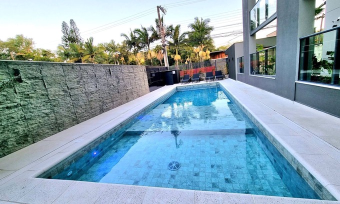 Itajai Apartment | Modern Apartment with Pool in Scenic Praia Brava